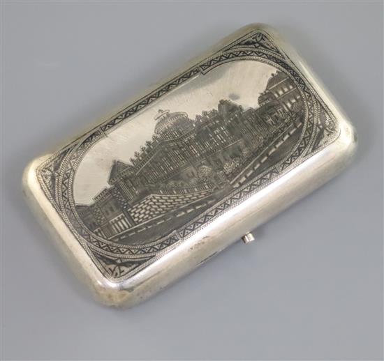 A 19th century Russian 84 zolotnik silver and niello cigarette case, decorate with scene of Pashkov House?, Moscow, gross 150 grams.